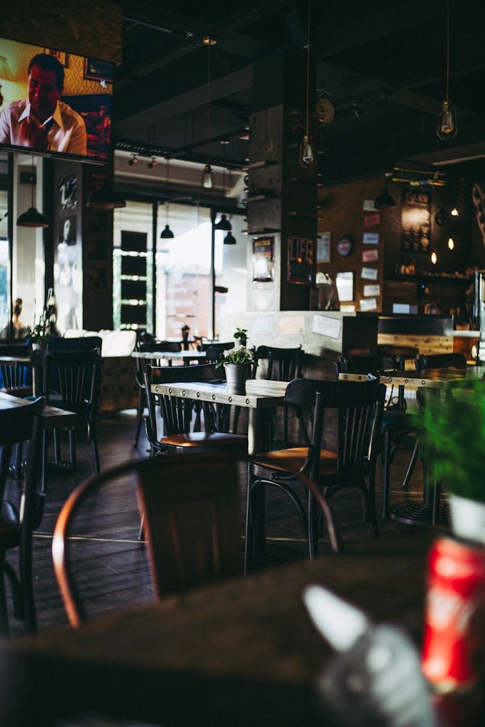 Warm and inviting restaurant interior showcasing modern decor and ambient lighting.